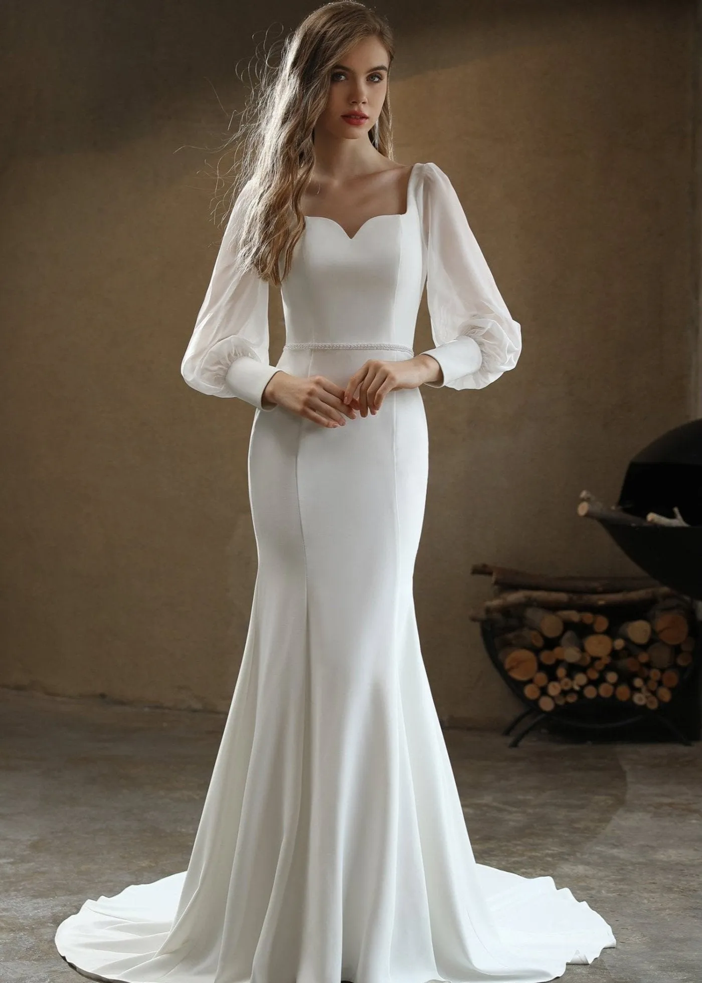 Karinda Ivory fitted wedding gown with sleeve s10 Express NZ wide